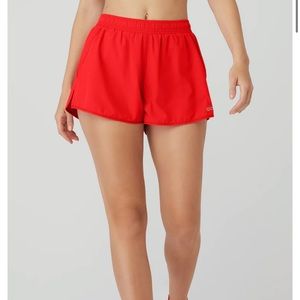 Red Alo stride shorts